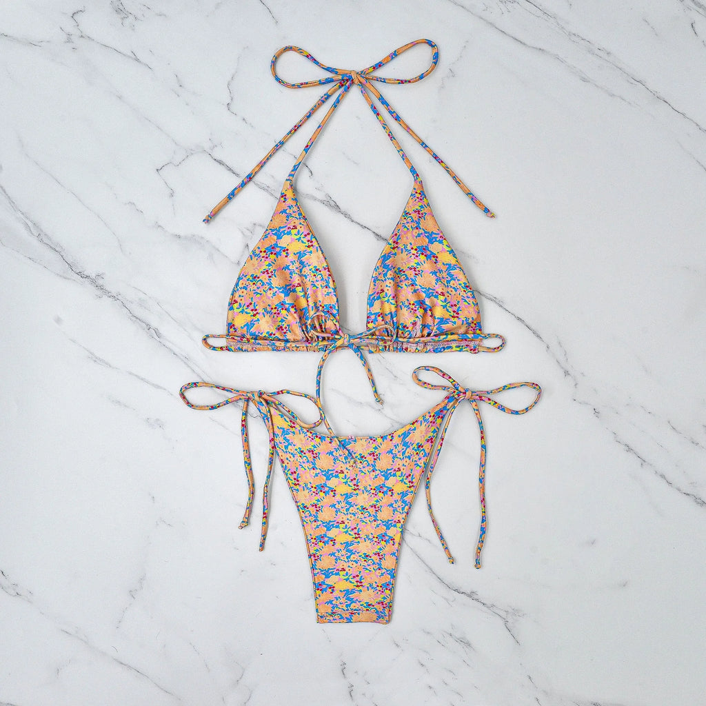 Women's lace-up bikini set in polyester for swimming, showing backless design.