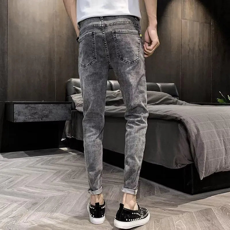 Men's high-waist denim jeans with button fly in basic style
