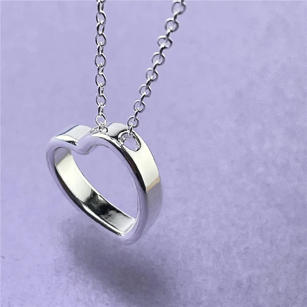 Silver heart necklace for women with 45.5cm chain and 2.6 x 2.8cm heart pendant in thick silver plating over copper.