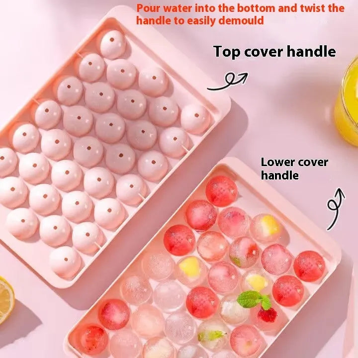 Blue 33-grid round silicone ice cube tray with transparent lid next to pink version, showing dimensions.