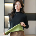 Women's fleece-lined half high-necked long sleeve bottoming shirt in black on model