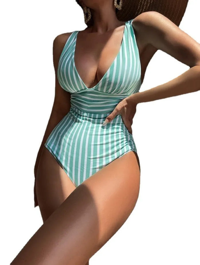 One-piece women's swimsuit with stripes pattern, polyester fabric, available in multi-colour options