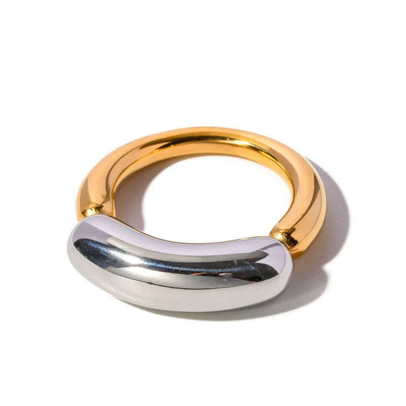 18K gold-plated double-arc geometric stainless steel ring for women on white background