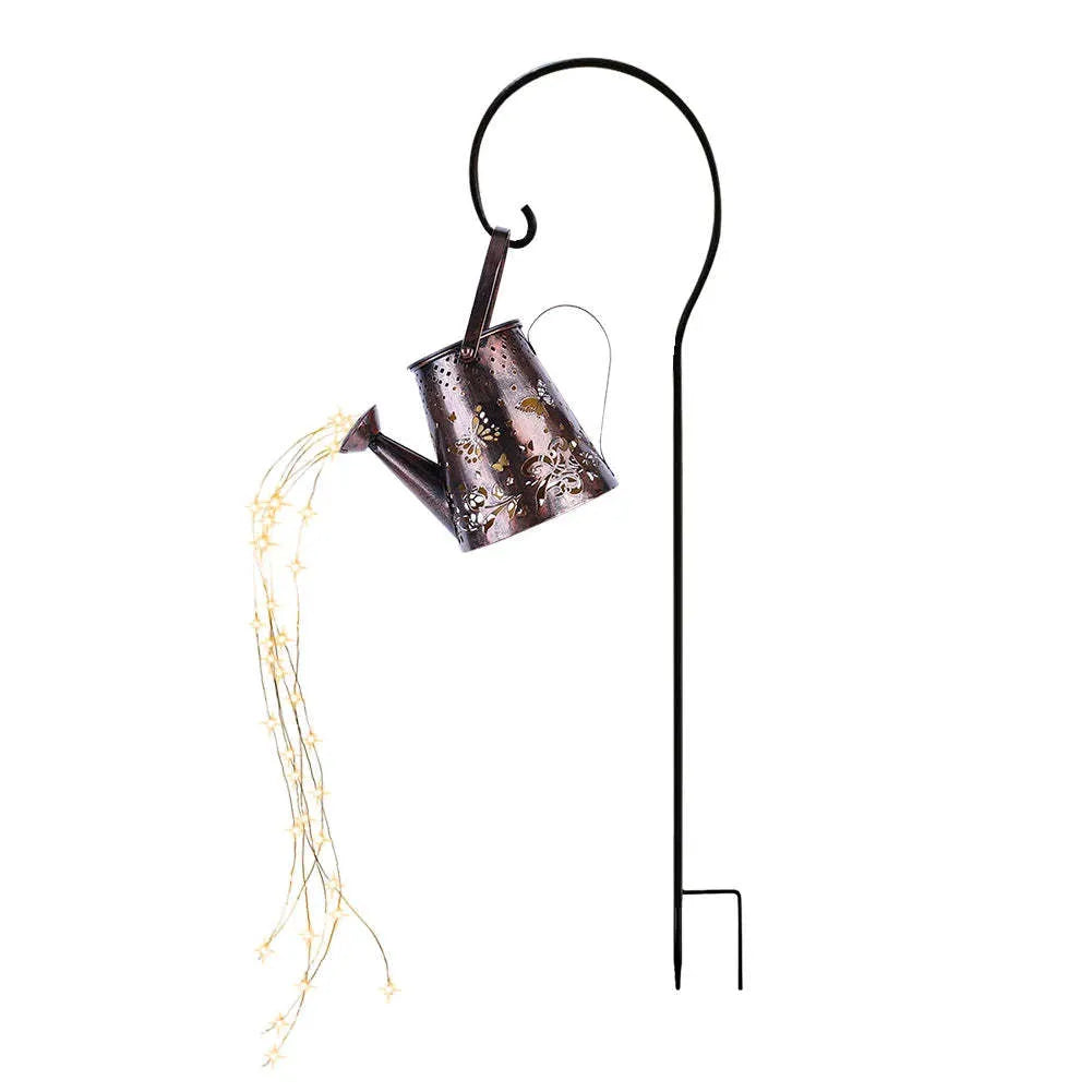 Solar garden lamp with iron tapered butterfly design and warm white LED light.