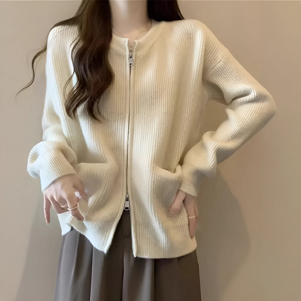 Beige viscose fibre long sleeve sweater coat cardigan laid flat.