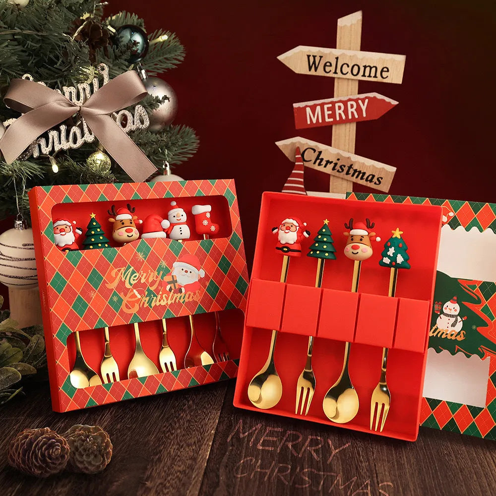 Stainless steel Christmas spoon and fork set with festive handle designs on a red background.
