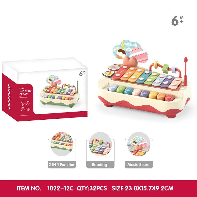 Educational eight-tone toy piano baby xylophone in coral red plastic with keys and mallets for infants