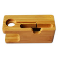 Bamboo desk stand holding a watch and smartphone on an office desk