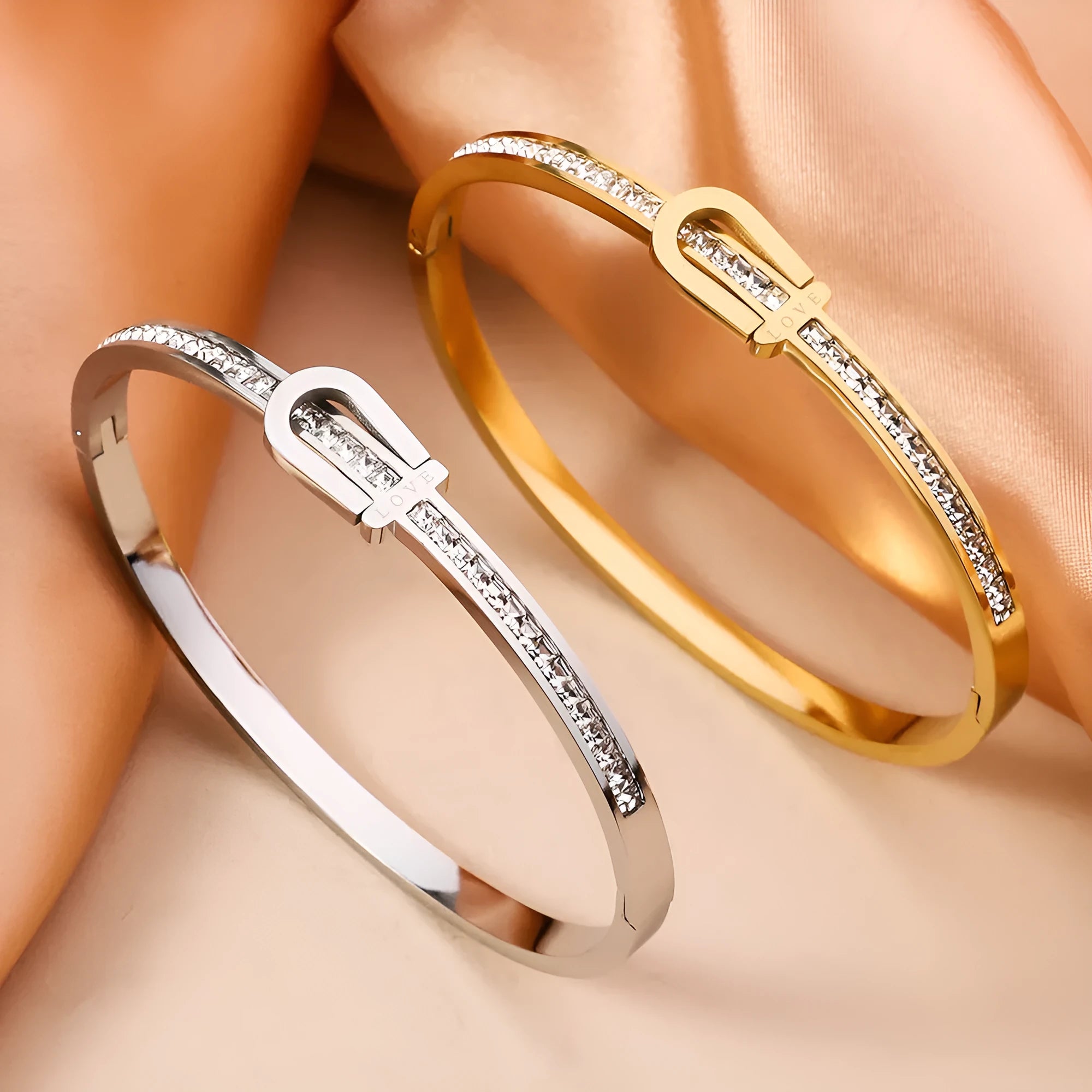 Gold plated titanium steel bangle bracelet with gang drill style, available in gold and steel colours.