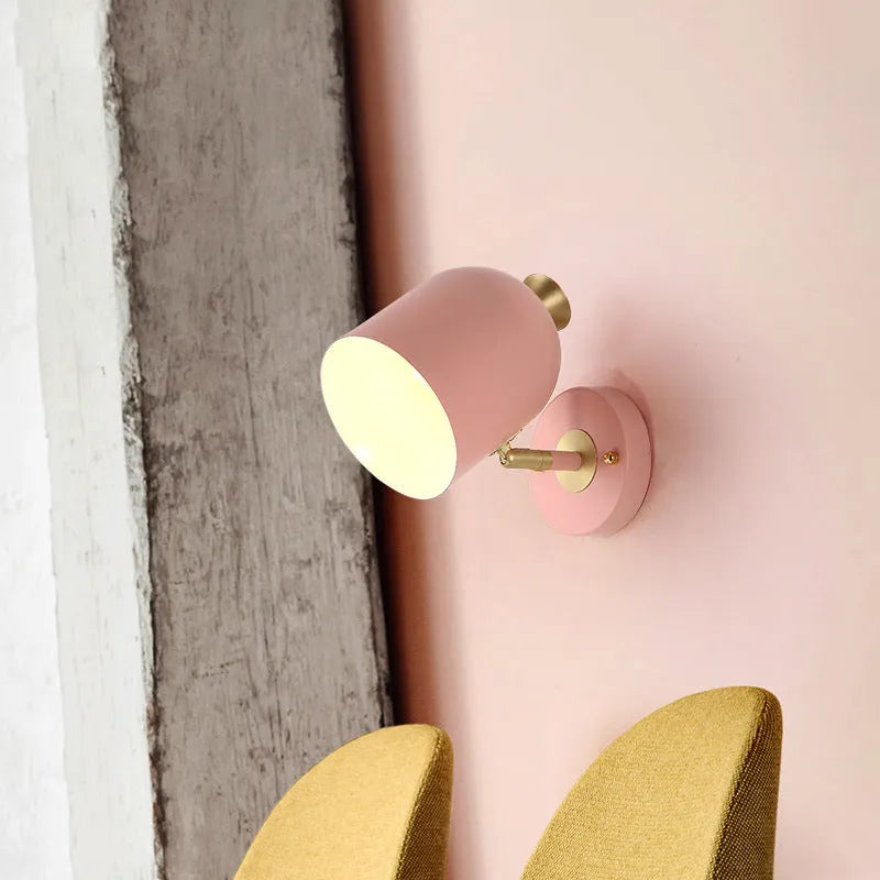 Single-head circular bedside wall lamp in aluminium, available in blue, green, pink or yellow.