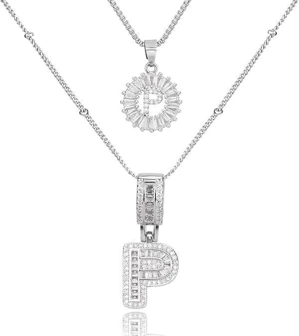 26 English letters copper-plated gold diamond initial pendant necklace with adjustable chain on display