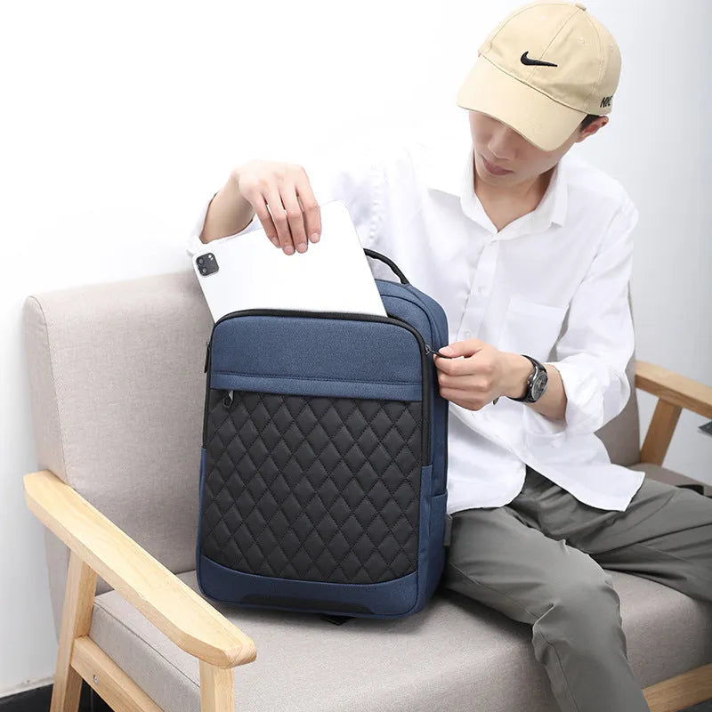 Men's Oxford cloth backpack in black with curved shoulder straps and diamond mesh detailing