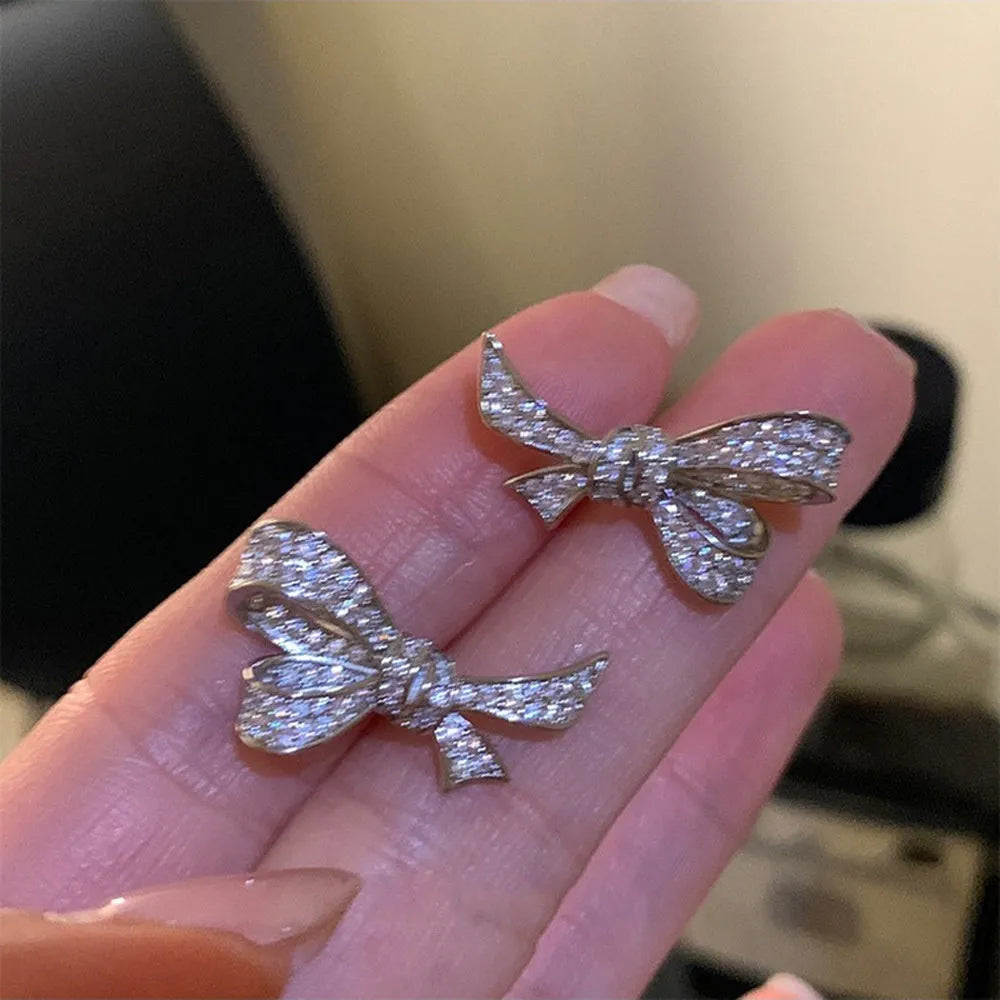 Gold or silver bowknot earrings with copper base, electroplating, 925 silver needle, and zircon inlay
