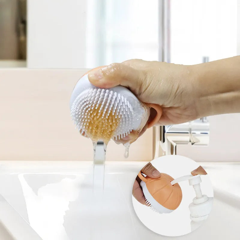 Orange TPR dog bath brush with shampoo dispenser and pumpkin-shaped grip