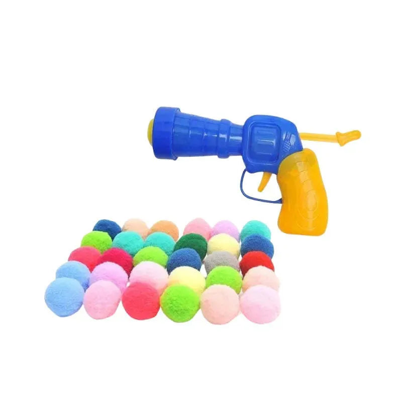 Pet toy launch gun with colourful soft plush yarn balls for interactive cat and dog play