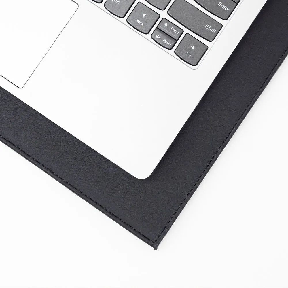 Durable tablet pad for printing in black, blue, green, and black gold colour options on a desk.