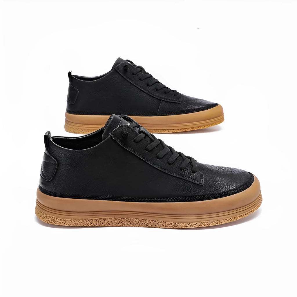 Men's black leather casual shoes with a round toe, flat heel, and lace-up closure on a rubber sole.