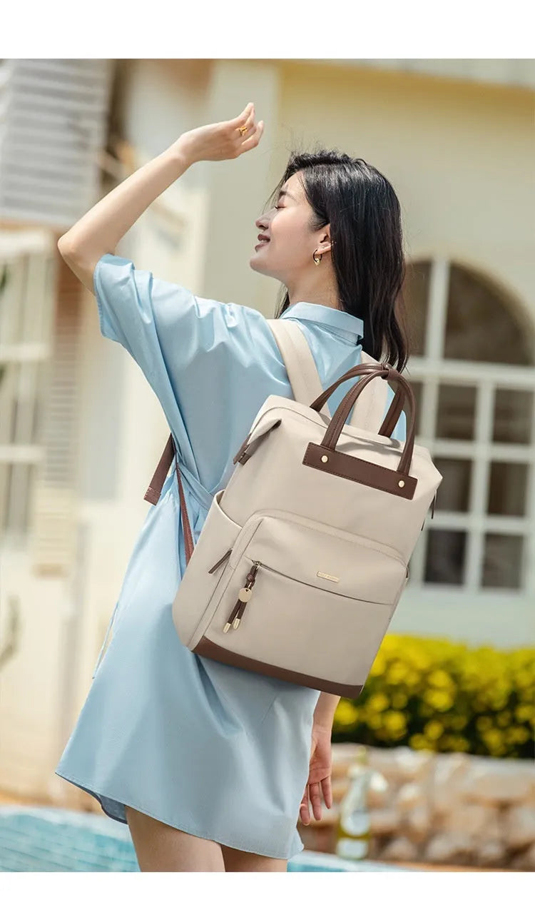 Women's large synthetic leather backpack in apricot, shown with adjustable straps and fabric lining.