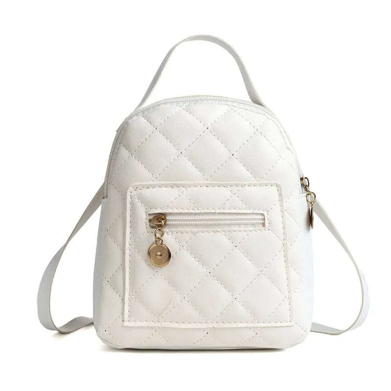 Hard square girls backpack with embroidered floral design in pink colour.