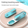Blue portable dog water bottle with a foldable silicone drinking bowl deployed, for outdoor use.