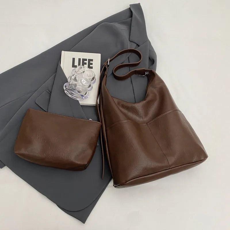 Women's large-capacity soft PVC shoulder bag bucket shape with stitching in beige white colour