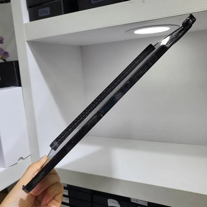 Carbon fibre flat hard protective cover for Apple iPad Pro 11 showing embossed plaid pattern.
