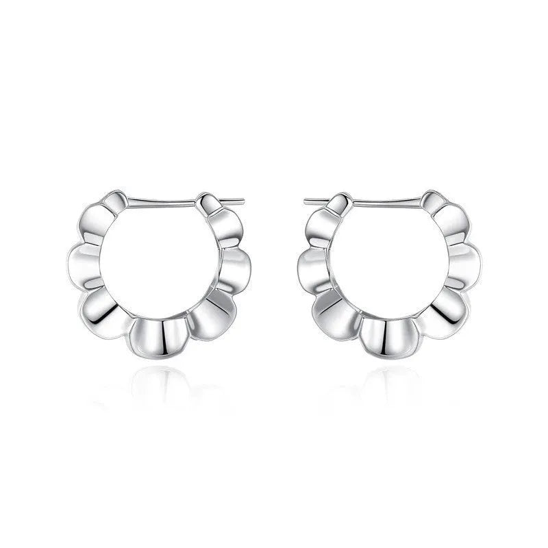 A pair of sterling silver retro geometric earrings with round elements and an electroplated finish.