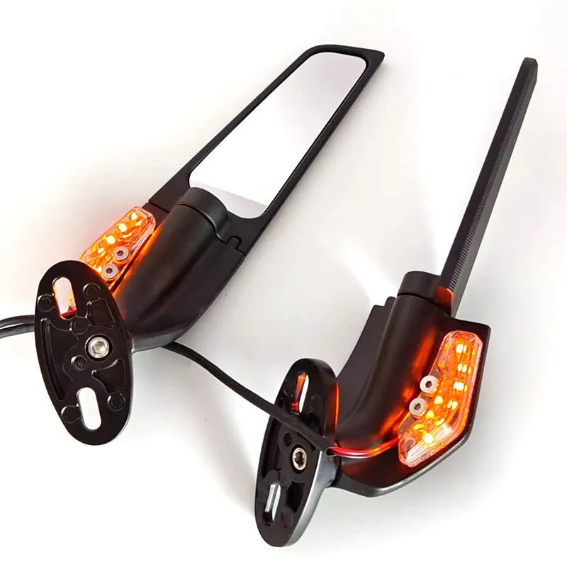 Pair of aluminium motorcycle mirror spoilers with yellow LED lights and convex glass lenses.