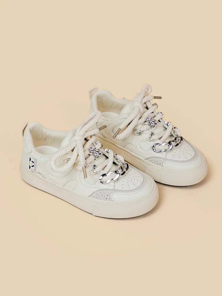 Casual white low-top lace-up sneakers for women with rubber sole and thick bottom heel
