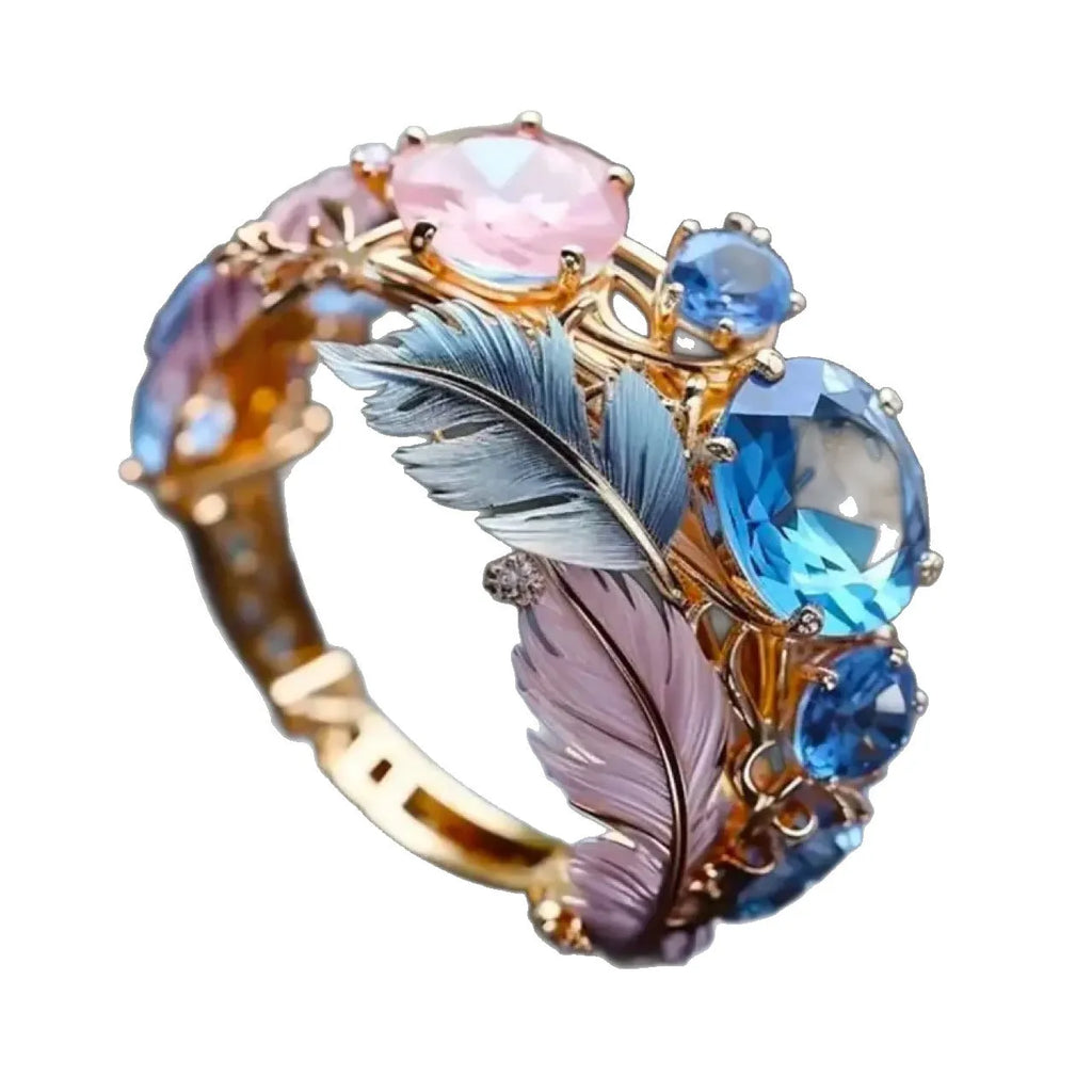 Gold embossed feather ring with colourful zircon geometric design on brass
