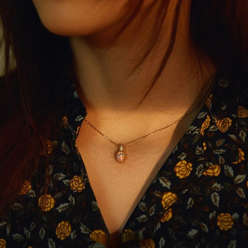 Japanese-style light wings opal pendant necklace in copper with geometric round design