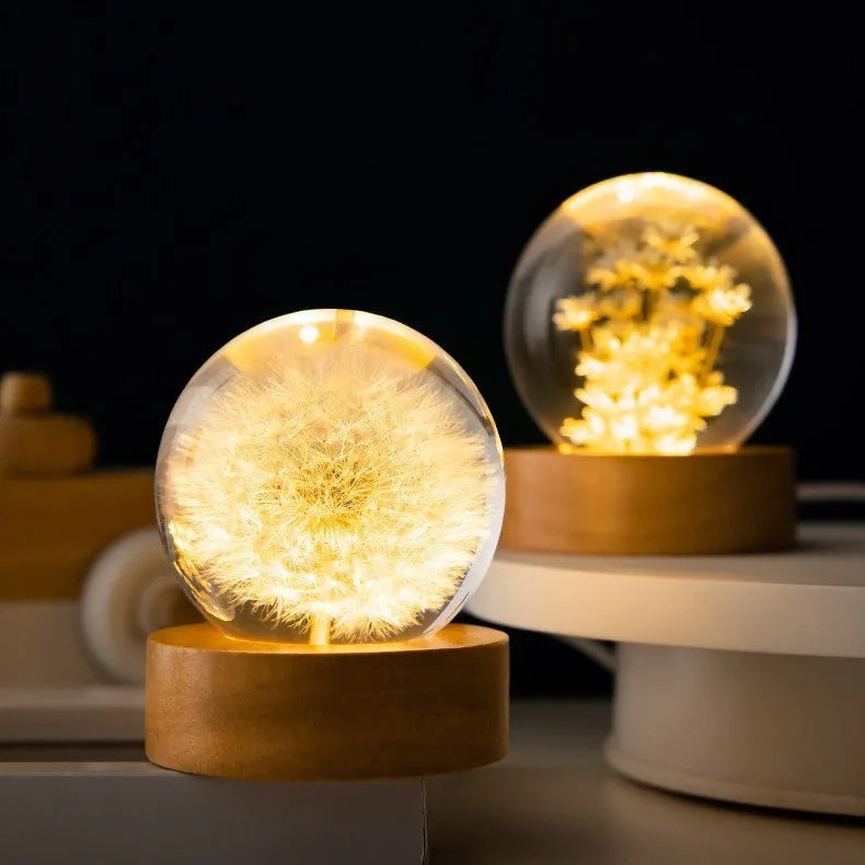 3D dandelion flower inside a 60mm clear crystal ball night light on a beech wood stand