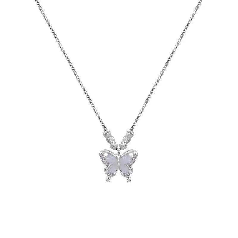Women's silver butterfly necklace with square opal pendant on a cross chain, adjustable length.