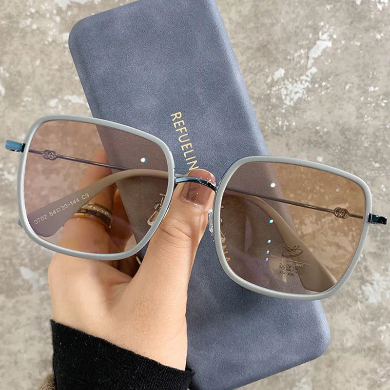 Photochromic myopia glasses with large frame, anti-blue light lens, available in four black gold frame colours