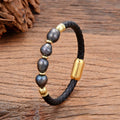 Handmade leather bracelet with irregular shaped pearls in grey pearl-black colour combination