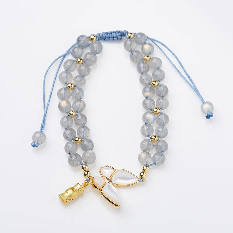 Grey moonstone butterfly charm woven bracelet for women with geometric retro styling