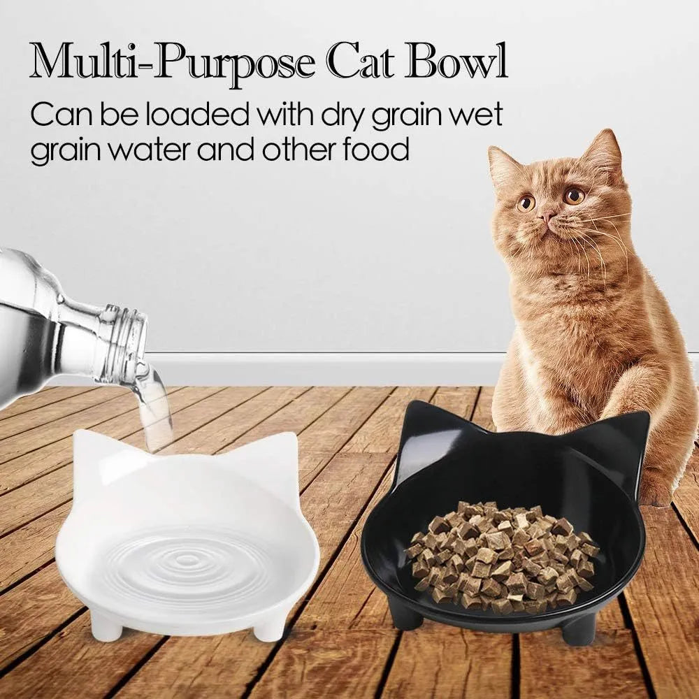 Shallow black melamine cat bowl with non-slip rubber base on a kitchen counter.