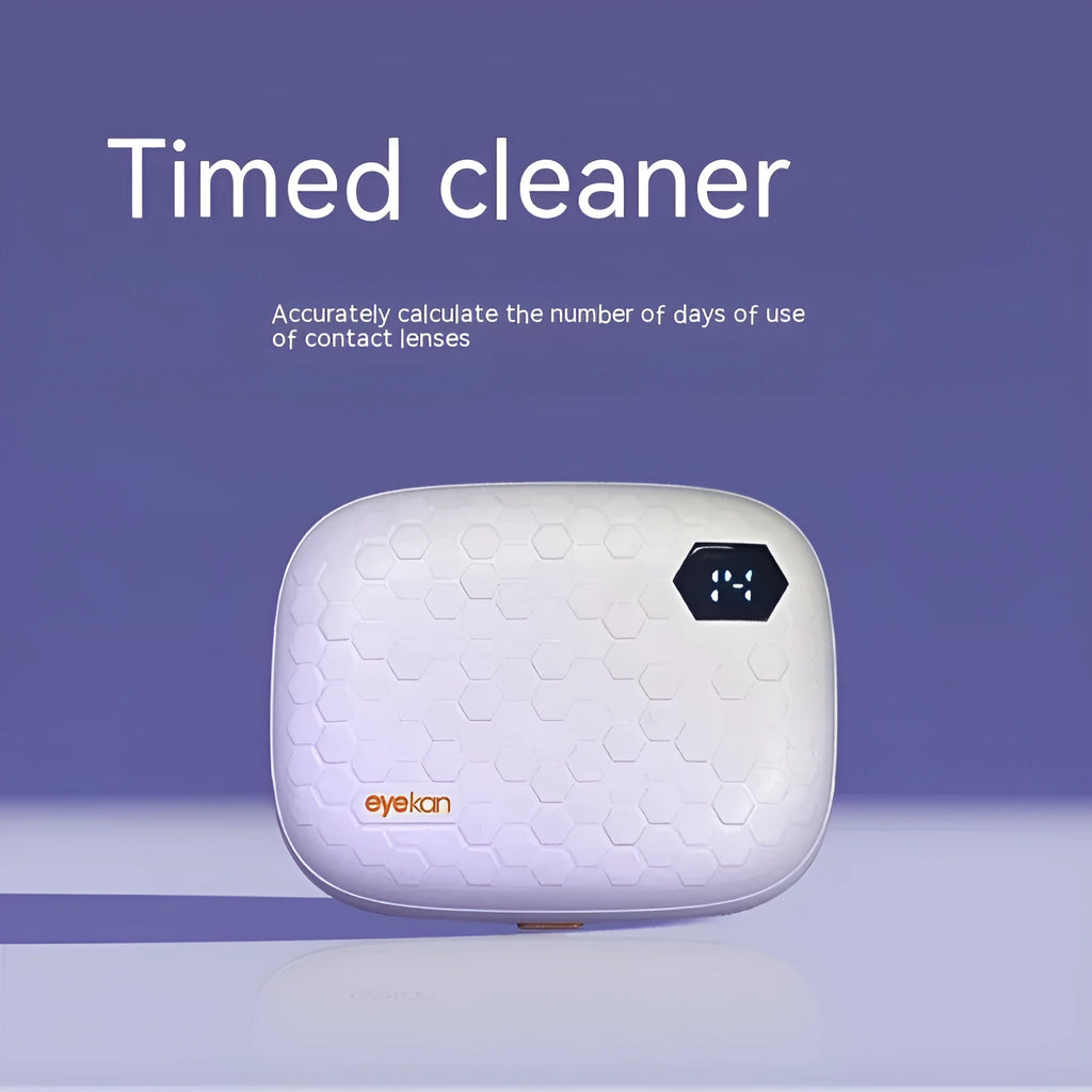 Pearl white automatic ultrasonic flushing instrument for cleaning glasses on a table.