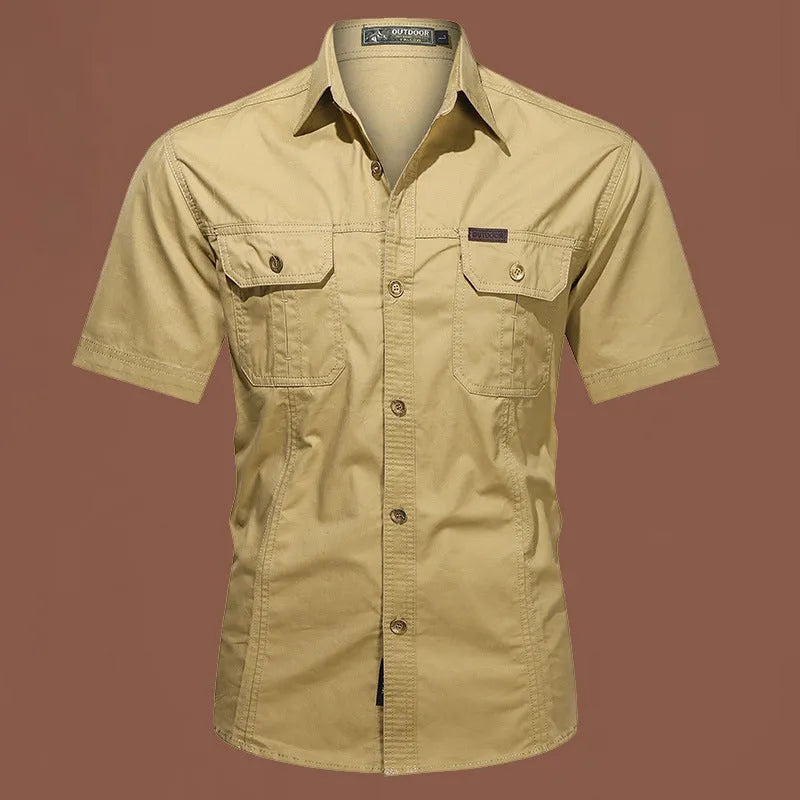 Men's short sleeve cotton work shirt in army green, showing loose fit and cardigan-style design.