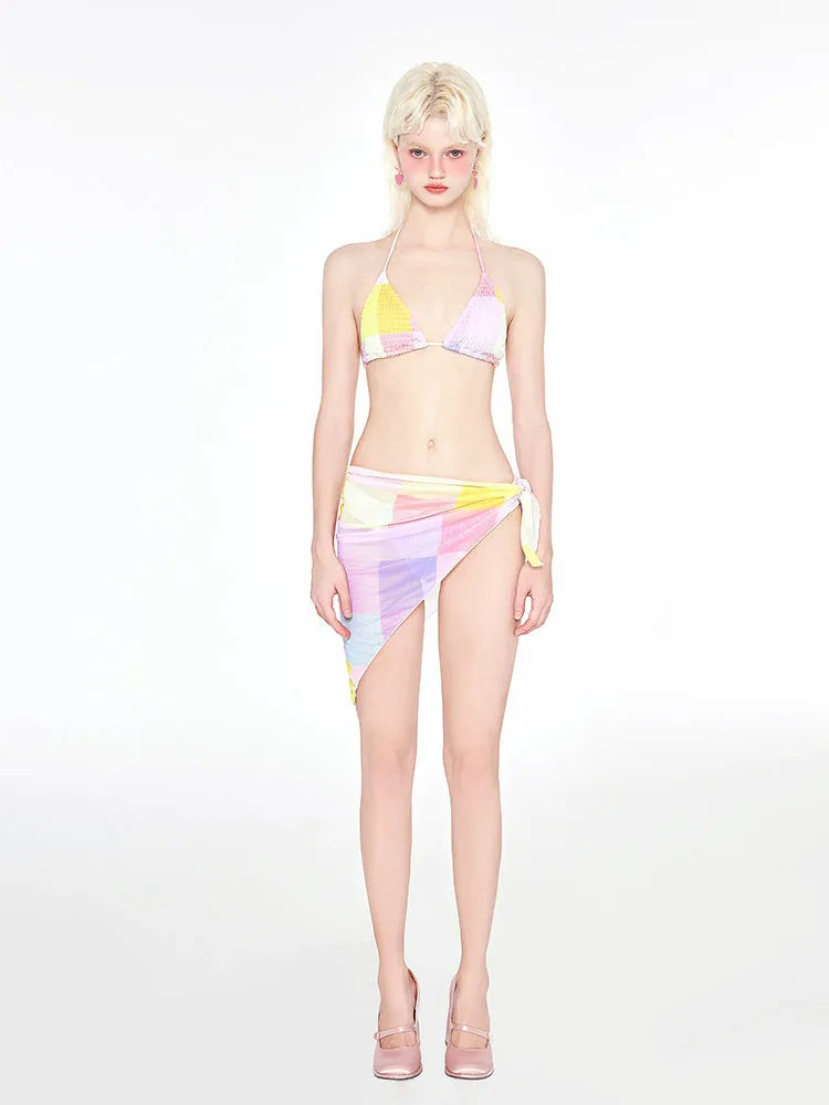 Rainbow pink women's triangle bikini three-piece swimsuit set on a mannequin.