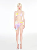Rainbow pink women's triangle bikini three-piece swimsuit set on a mannequin.