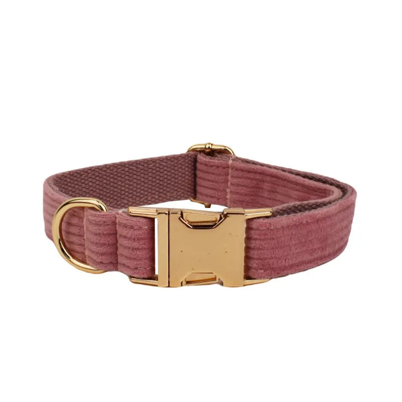 Corduroy dog collar and matching five-piece accessory set with leash, vest, bow, and bag in coordinated colours