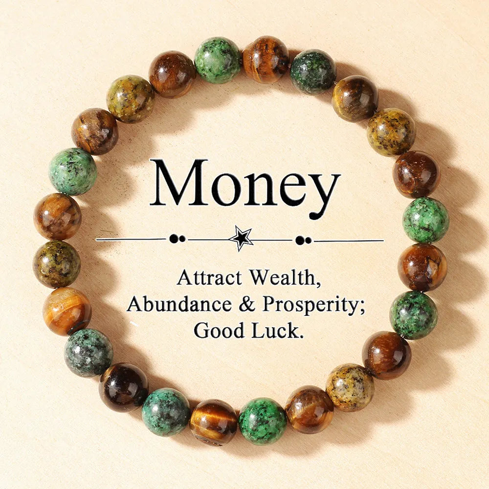 Tigereye natural stone fortune bracelet showing antique floral design and handmade construction