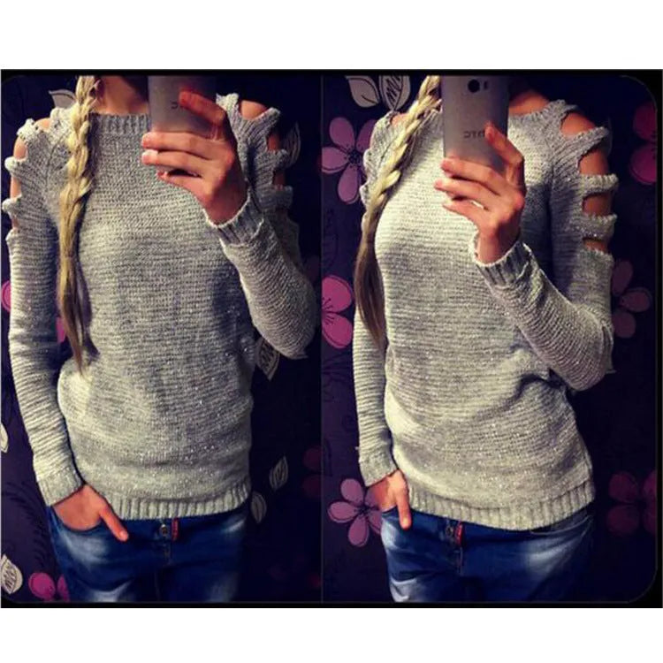 Women's grey knitted pullover shirt with hollow-out crochet pattern on the sleeves and body.