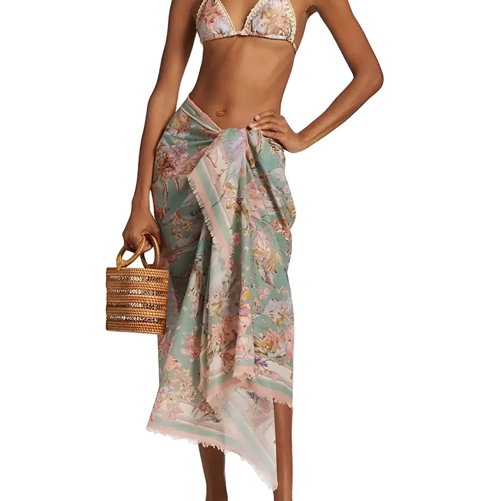 Women's creamy-white floral nylon bikini set with detachable skirt shown in sizes S-XXL