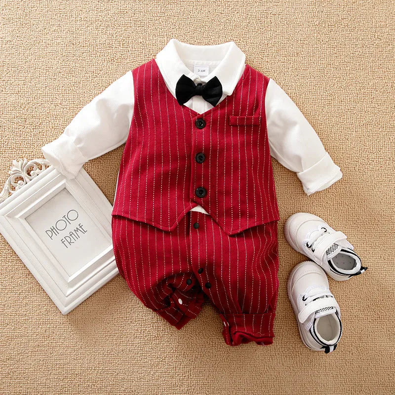 Baby boy wearing a wine red cotton gentleman jumpsuit with long sleeves and single-breasted closure.