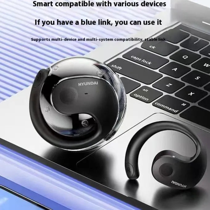 Coconut Ball wireless Bluetooth ear-mounted noise reduction headset in beige, side view showing ear hook and compact design