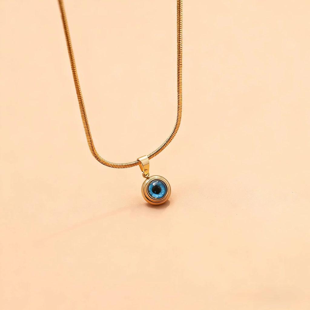 Angel Eyes titanium steel necklace with gold-plated eye pendant on 45.5cm snake bone chain