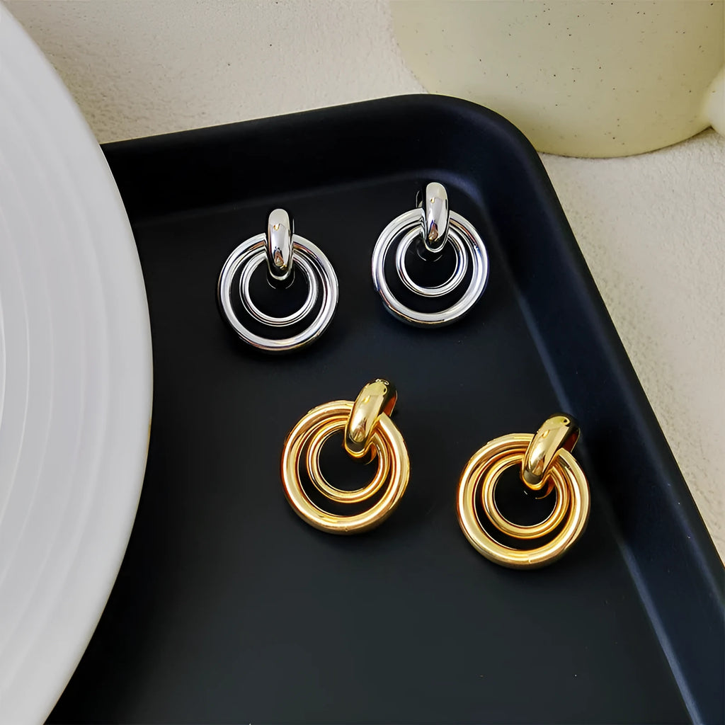 Geometric round ring earrings with irregular shape in gold and silver colour options
