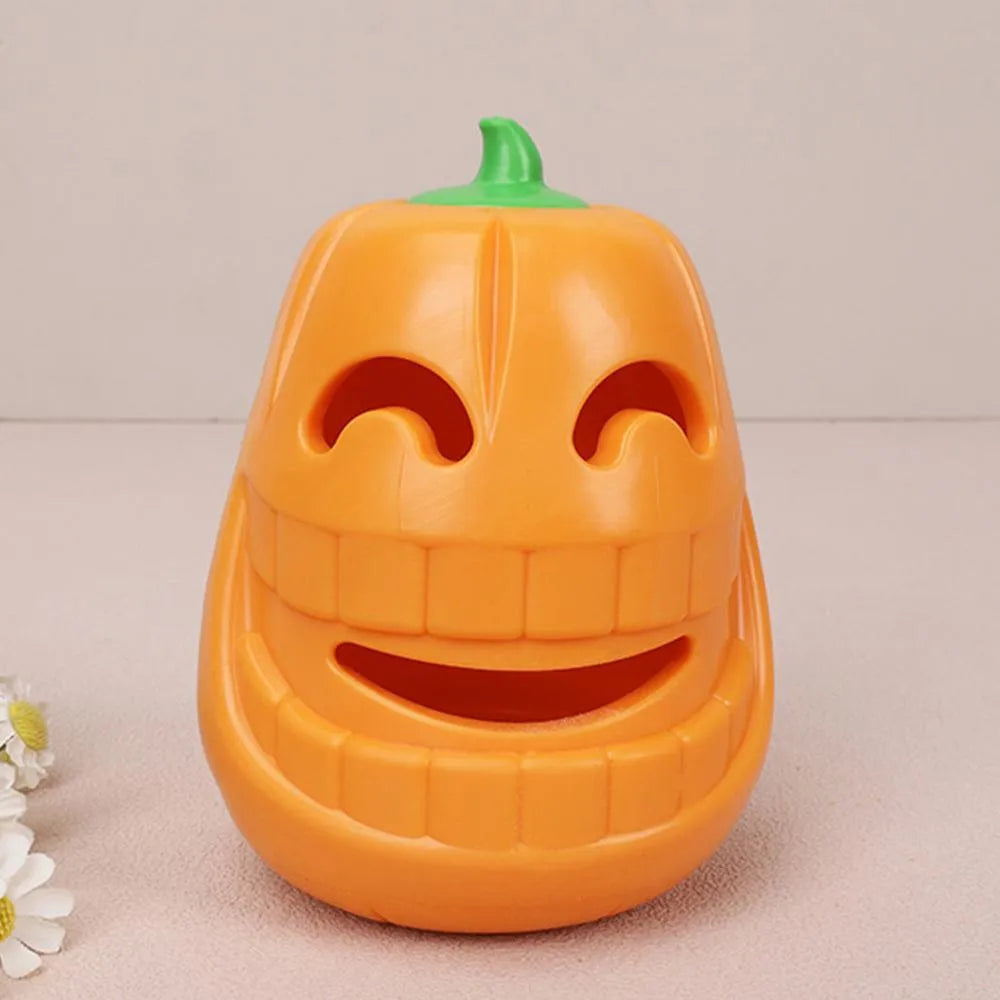 Yellow pumpkin-shaped TPR dog chew toy for aggressive chewers, showing textured ridges.